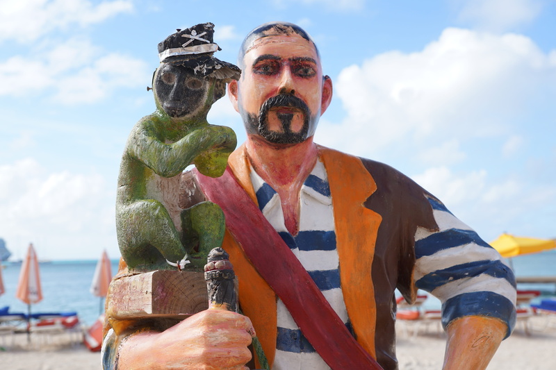 5K, figure, mature men, sky, ocean, beach, incidental people, men, adult, day, nature, film, males, water, st maarten, history, clouds, sculpture, philipsburg