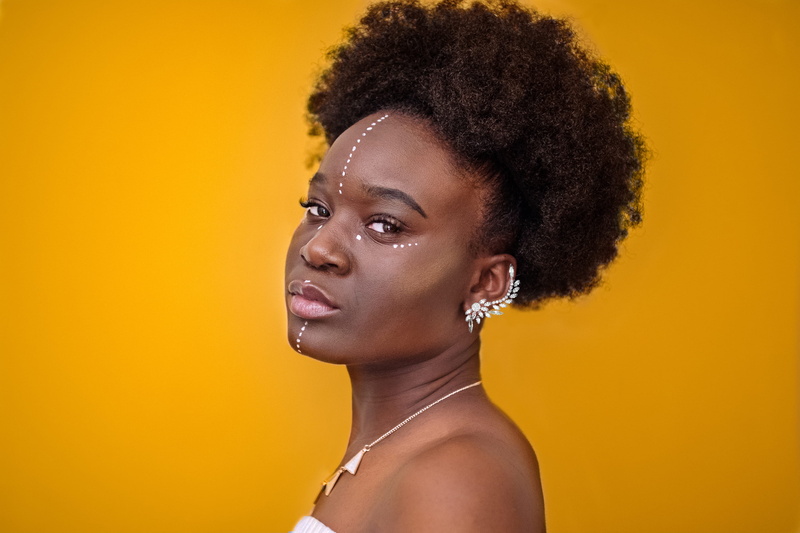 s, beauty, curly hair, adult, make-up, orange, human face, tribal, profile view, beautiful people, kinky hair, silver, face paint, artistry, studio shot