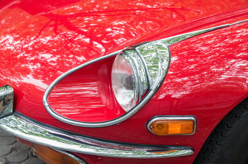 transportation, land vehicle, mode of transportation, car, reflection, front headlight, motor vehicle, auto, headlight, spotlight, bumper, glass - material