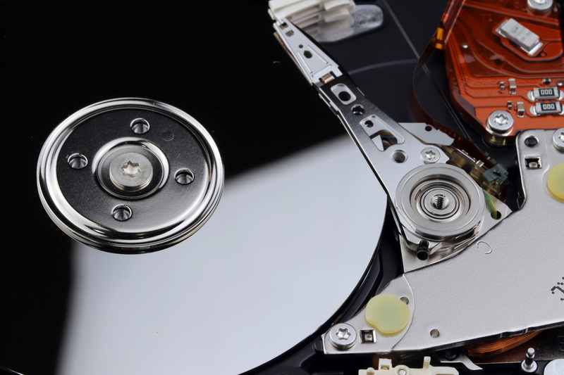 hard disk, computer equipment, black background, equipment, silver colored, circle, music, studio shot, geometric shape, 5K, no people, computer part