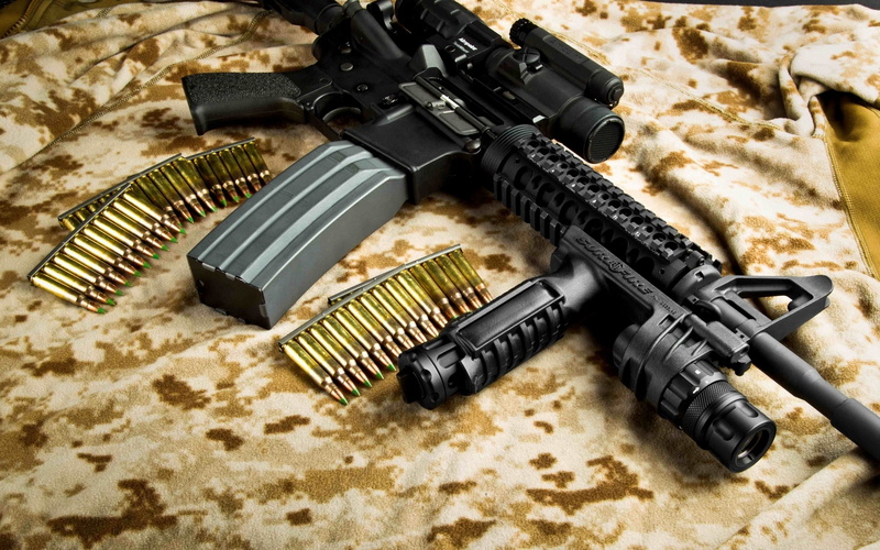 magazines, still life, rifle, arts culture and entertainment, black, close-up, high angle view, war, War and Army, weapon, gun, capacity, indoors, camera - photographic equipment