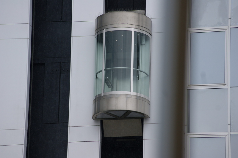 window, city, buildings, capacity, architectural column, floors, high, metal, outdoors, factory, built structure, electric, ascent, build, glass, windows