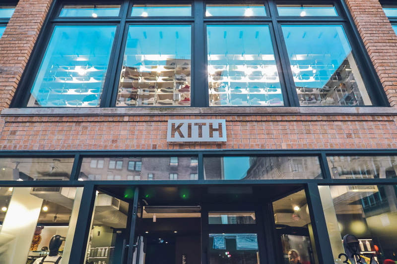 day, communication, person, door, sign, information, building, illuminated, built structure, western script, glass - material, reflection, high rise, office building exterior