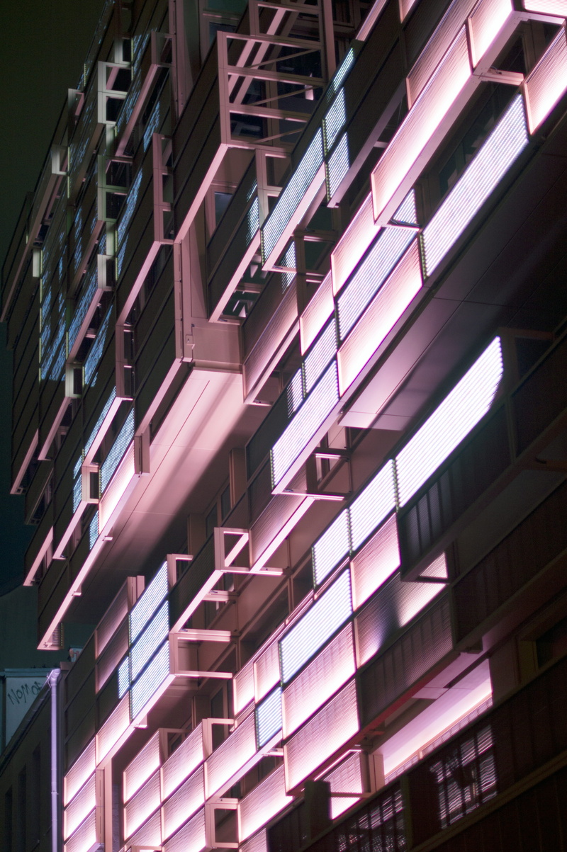 structure, pattern, flourescent, building exterior, 5K, glowing, residential district, building, window, no people, steel, nightlife, facade, purple, low angle view