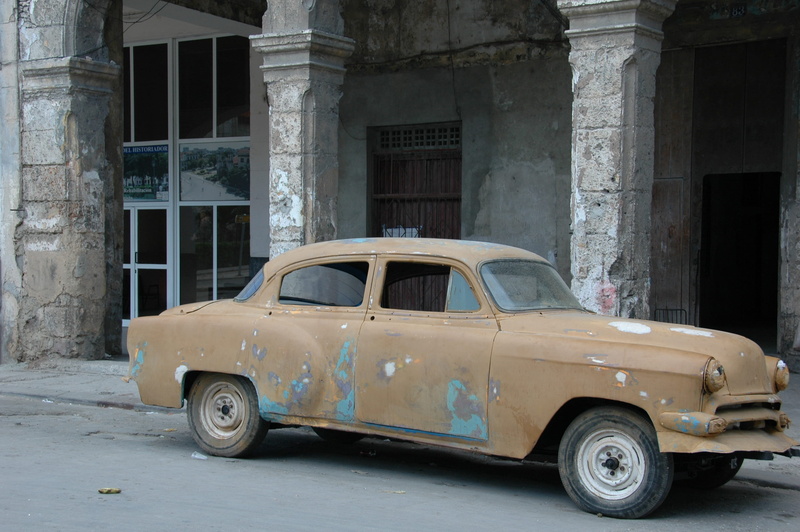 tire, hubcap, mode of transportation, automobile, spire, city, steeple, car, cuba, wheel, deterioration, old, land vehicle, rust, architectural column