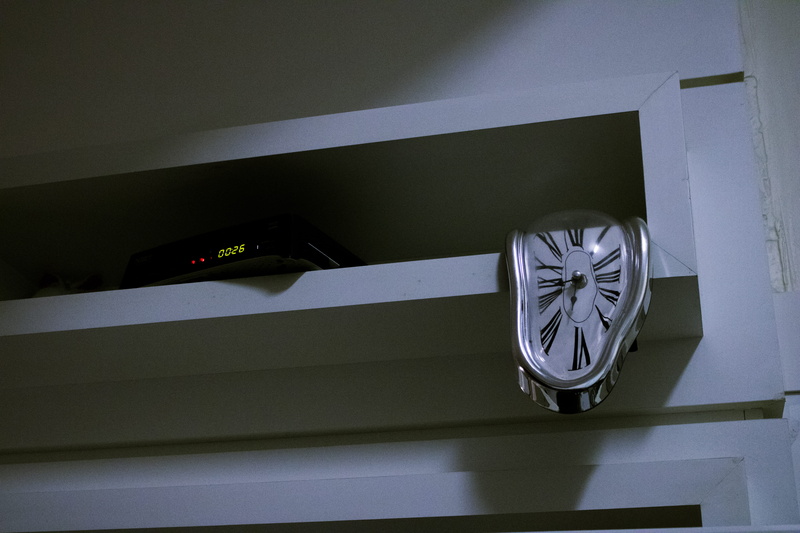 spoke, roman, transportation, close-up, instrument of time, wall - building feature, indoors, low angle view, shape, lcd screen, wristwatch, wheel, clock
