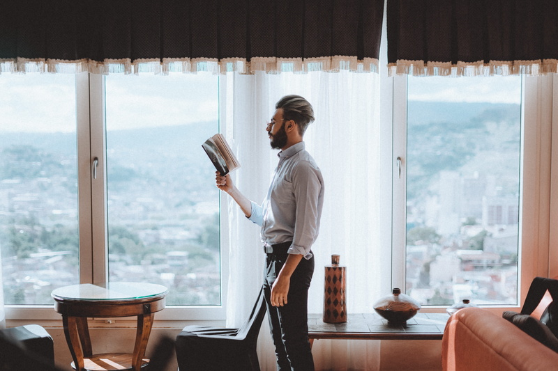 business, indoors, drink, book, reading, hair, three quarter length, chair, room, 5K, person, men, refreshment, cleaning, glass, man, hardwood, living room