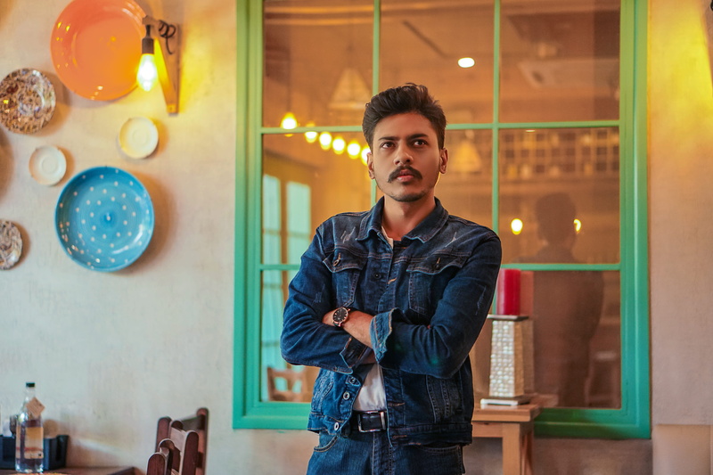 contemplation, lights, 5K, front view, man, one person, beautiful people, near, focus on foreground, young men, jeans, three quarter length, casual clothing