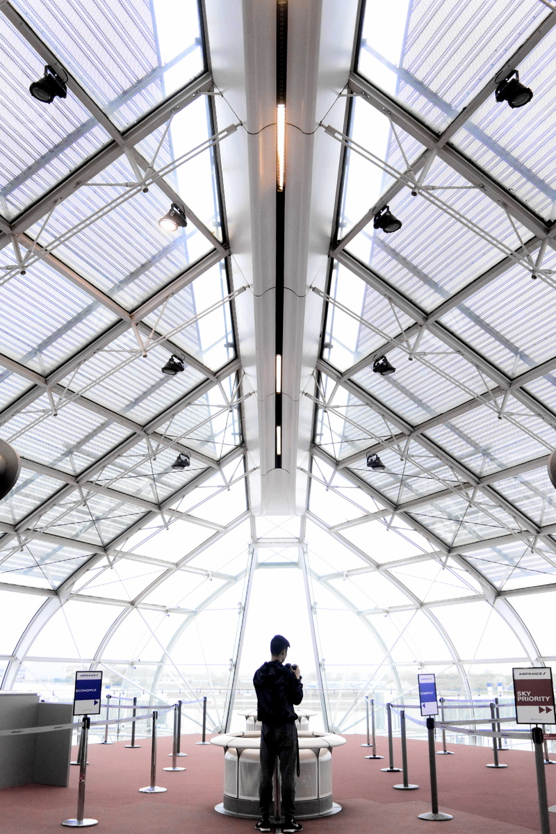 people, modern, glass items, built structure, illuminated, urban, man, day, architecture, adult, ceiling, leisure activity, lighting equipment, tall, steel