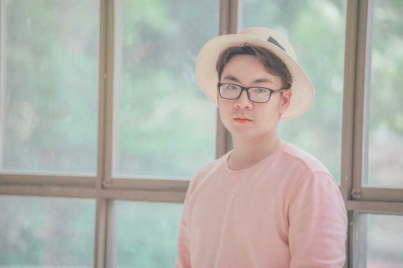 males, innocence, glass - material, looking, offspring, room, adult, front view, wearing, child, pink, men, glass items, wear, relaxation, daylight, panel