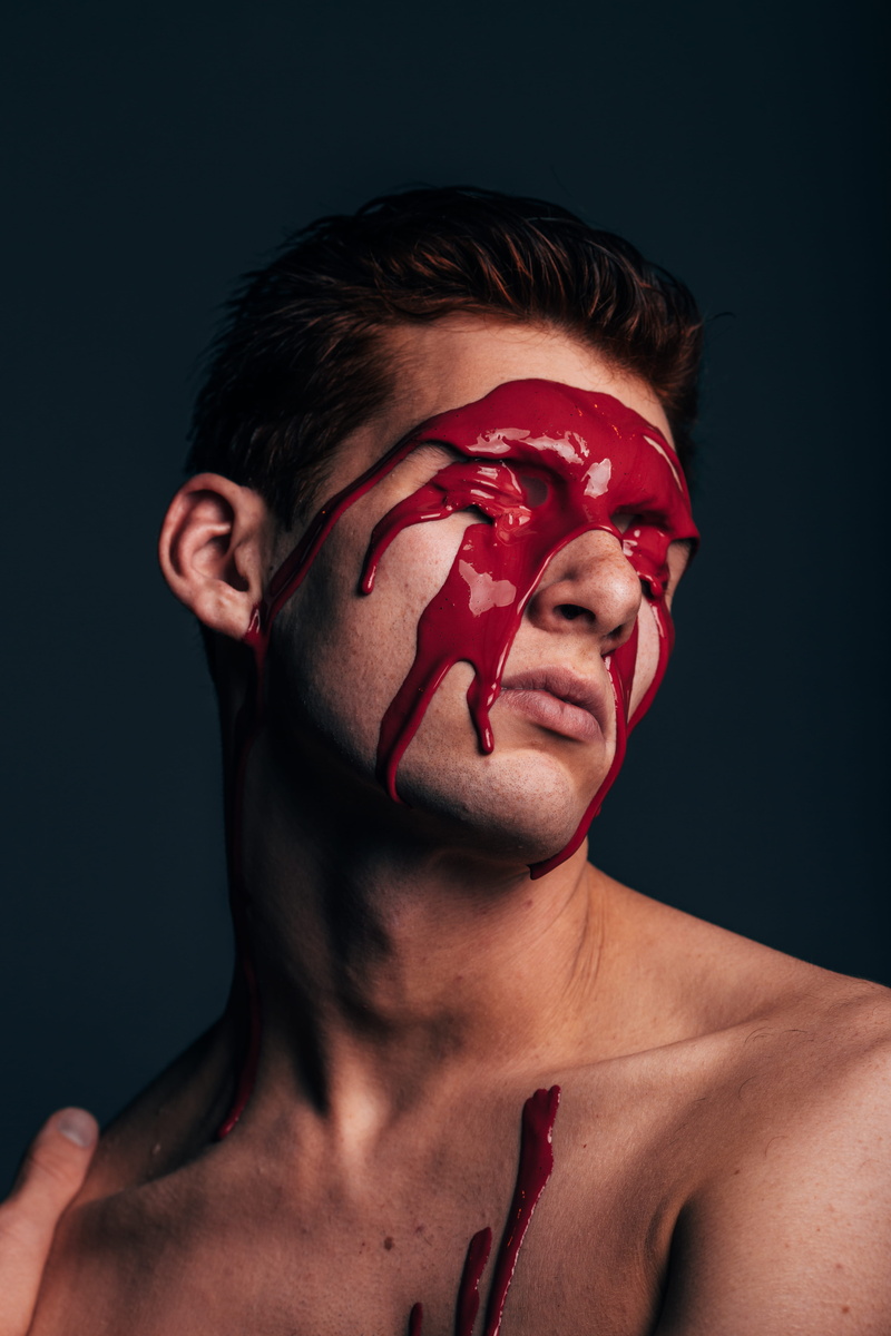 young adult, wax, shirtless, studio shot, male, red, s, human face, dark, spooky, hair, one person, human blood, looking at camera, human body part, make-up