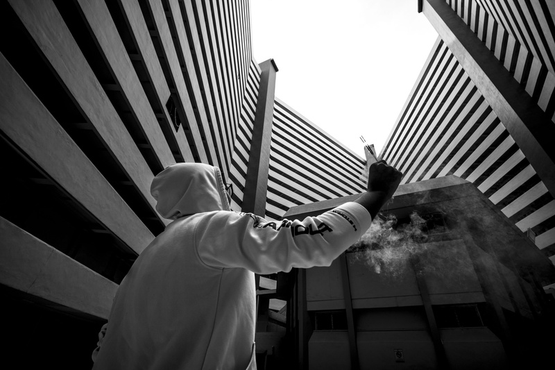photo, human hand, lifestyles, men, arms raised, window, raising, smoke, waist up, standing, male, day, grayscale, real people, building exterior, architecture
