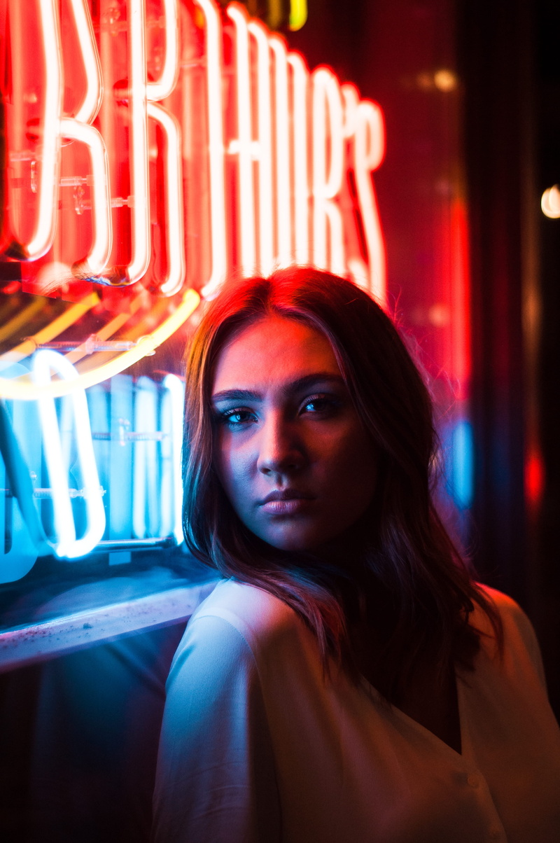close-up, facial expression, young adult, women, signage, illuminated, beautiful woman, neon lights, night, standing, portrait, leisure activity, adult