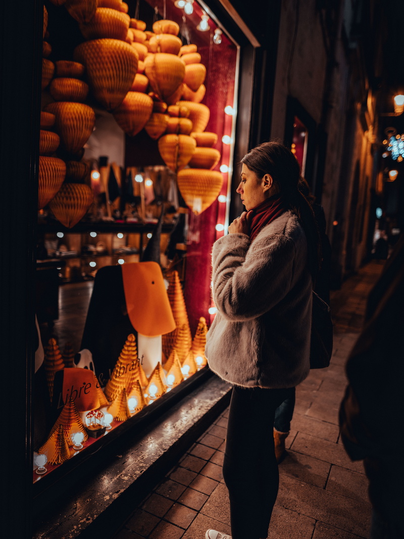 lamp, scarf, light, young adult, clothing, leisure activity, footwear, bazaar, bar counter, real people, people, young women, street, adult, store, food and drink
