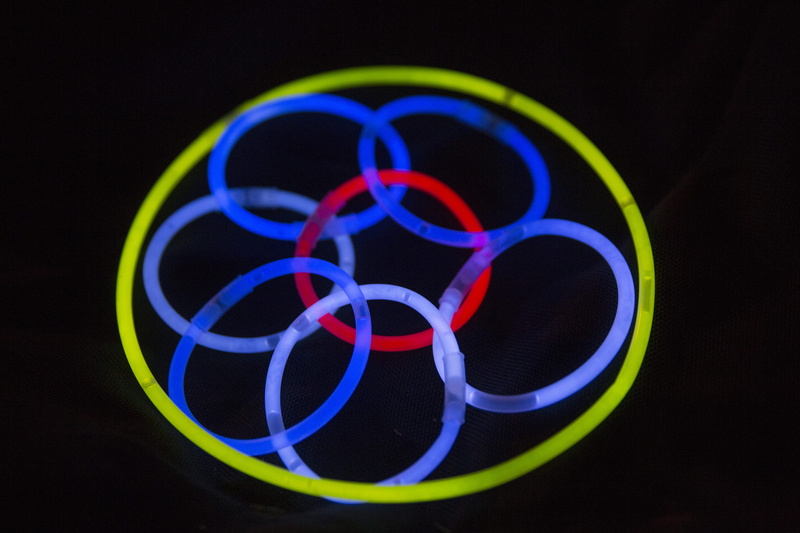 block party, 5K, indoors, fireworks, vibrant color, safe fun, neon colored, colorful shape, colorful, glow sticks, studio shot, no people, geometric shape