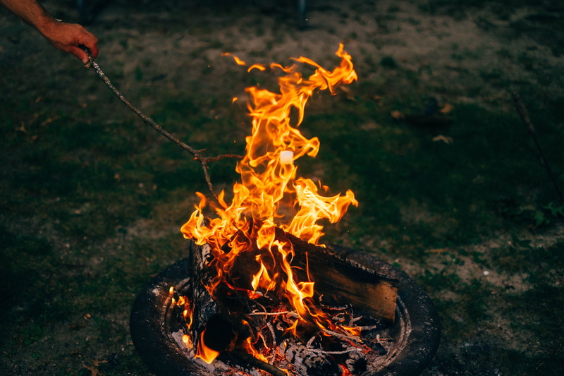 day, orange color, motion, nature, close-up, outdoors, no people, fire, flame, field, grass, stick - plant part, wood - material, heat, burning, night