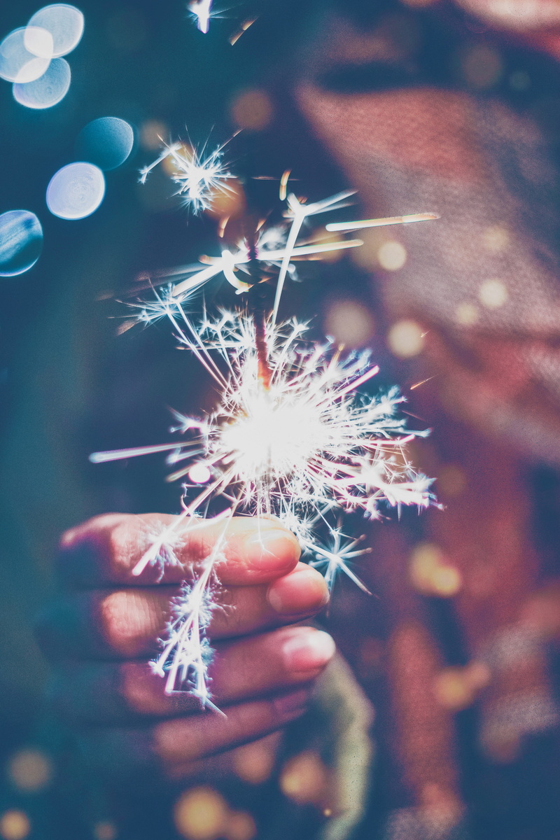 real people, body part, night, firework display, sparks, focus on foreground, event, firecracker, sparkler, arts culture and entertainment, hand, lifestyles
