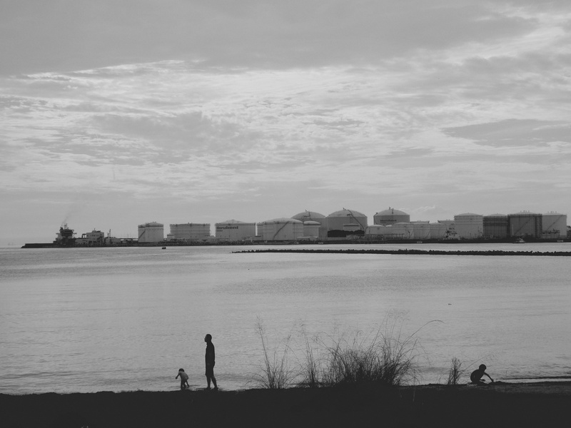 background, cloud - sky, people, outdoors, beach, water, environmentalism, building exterior, raffinery, ecology, kids, sky, architecture, chemicals, women