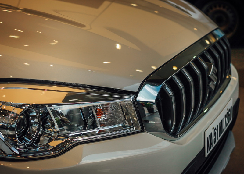 mode of transportation, shiny, scross, hood, illuminated, india, stationary, close-up, luxury, headlights, glass - material, wealth, headlight, bengaluru