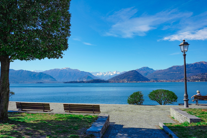 lamppost, beauty in nature, laveno, varese, tranquil scene, mountain range, mountains, no people, background, water, italy, spring, street light, vista