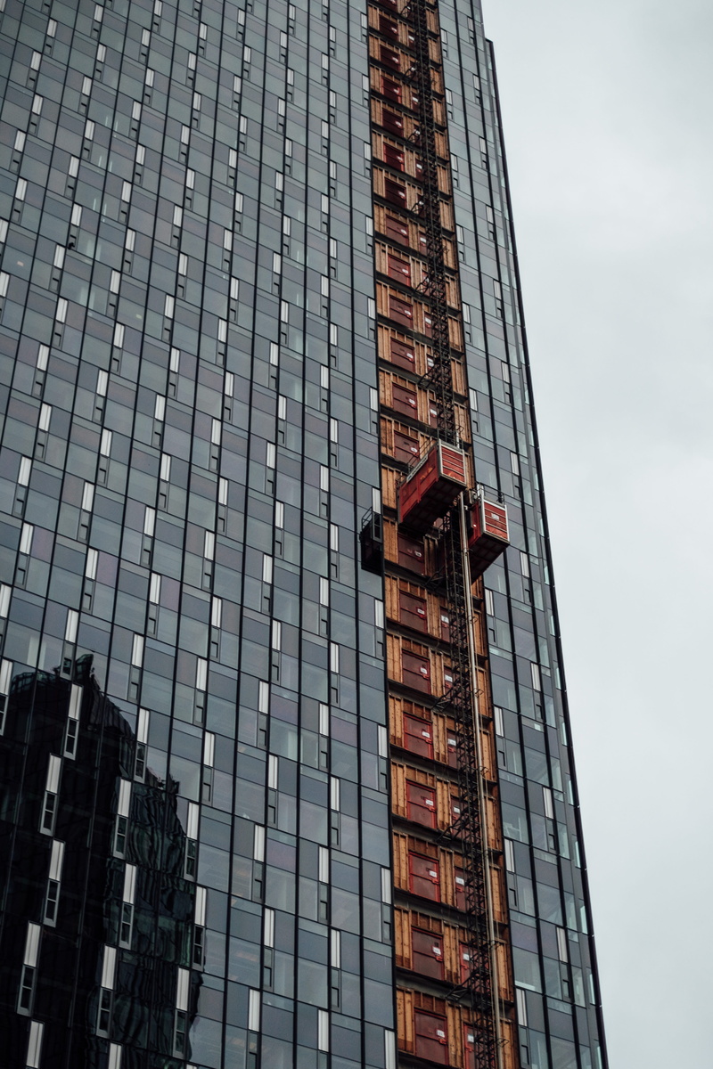 elevator, modern, fujifilm, skyscrapper, built structure, glass - material, side, fuji, construction, sky, outdoors, building exterior, home decor, town