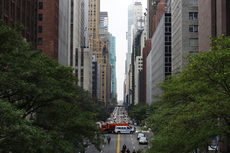car, new york, transportation, built structure, skyscraper, urban, residential district, location, mode of transportation, day, building, green color, no people