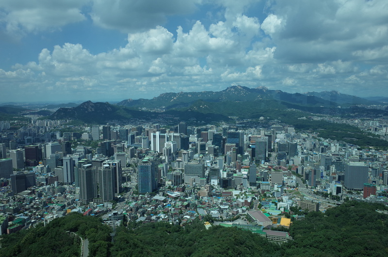 building exterior, residential district, city, high angle view, tall - high, mountains, nature, asia, buildings, architecture, landscape, built structure