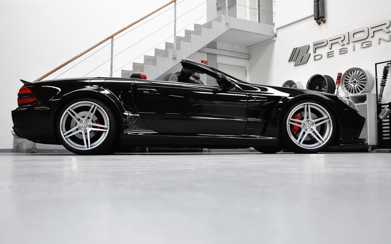 modern, architecture, surface level, s l, technology, prior design, 1080P, motor vehicle, car, 2011, sport, land vehicle, built structure, wheel, wealth