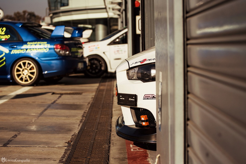 day, automobile industry, in a row, selective focus, close-up, Mitsubishi Lancer EVO, street, focus on foreground, vehicle, city, mode of transportation
