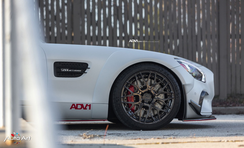 travel, city, luxury, outdoors, AMG Black Series, close-up, road, day, land vehicle, no people, 1080P, selective focus, wheel, mode of transportation