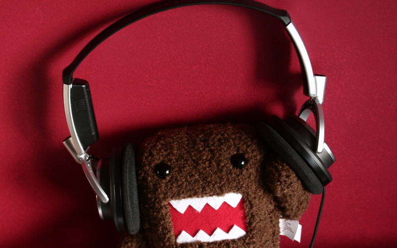 indoors, technology, body part, human body part, headphones, stereo, people, equipment, monster, plush, domo, Red, toy, close-up, listening, colored background