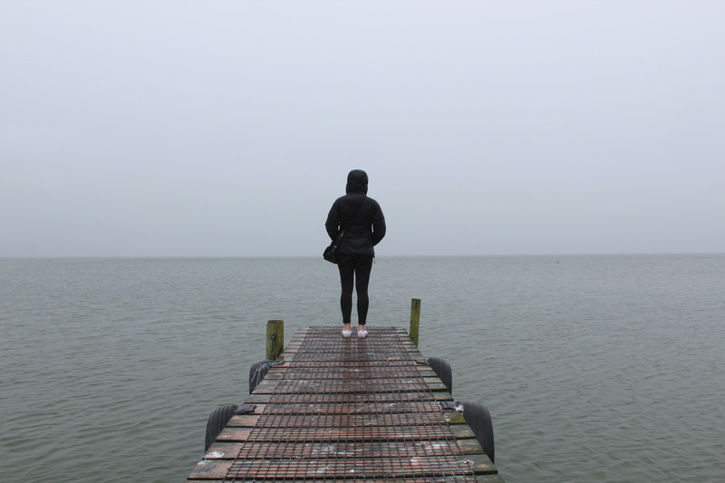 day, people, daytime, jacket, scenics, black, grey, one person, lake, woman, outdoors, rear view, hoodie, girl, water, sea, horizon, near, dock, pier, full length