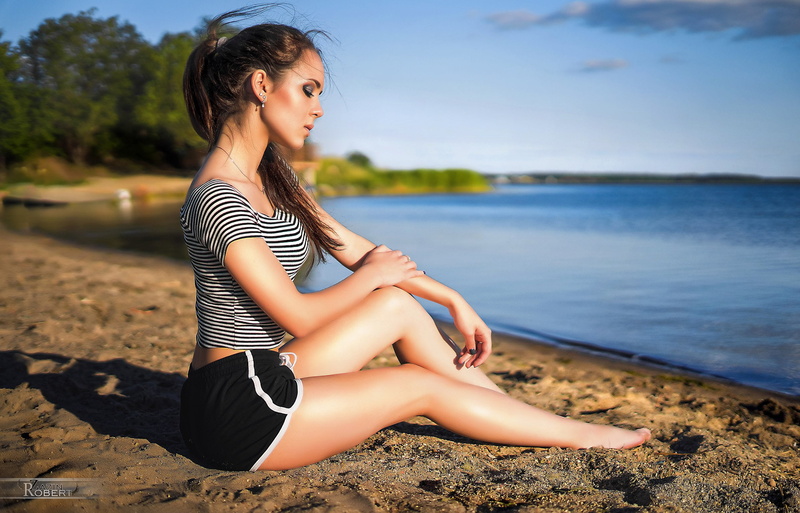 hairstyle, focus on foreground, tanned, sand, beautiful woman, beauty, young adult, contemplation, petite, leisure activity, sitting, 2K, young women