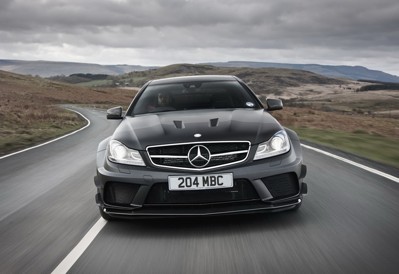mountain, c63, black, mode of transportation, symbol, sky, no people, road trip, motor vehicle, motion, nature, scenics - nature, day, text, road, coupe