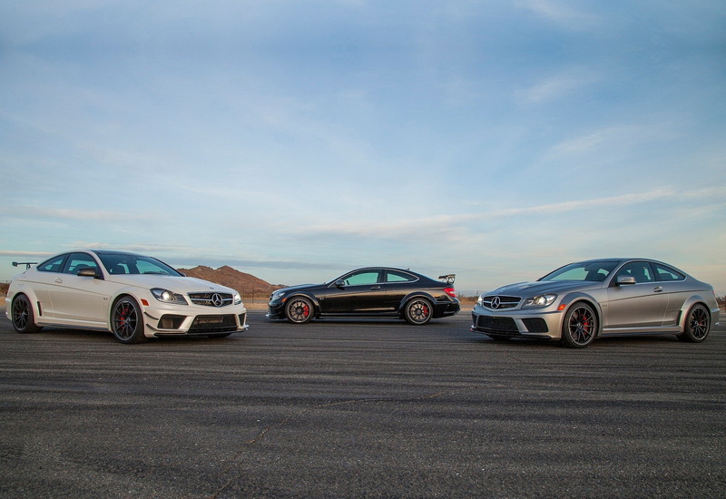 c63, motor vehicle, travel, parking lot, luxury, coupe, sports car, day, wealth, black, sky, outdoors, car, series, road, no people, land vehicle, sunlight