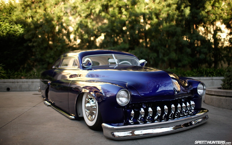 outdoors, chrome, stationary, blue, luxury, land vehicle, street, day, Chevy, mode of transportation, 1080P, transportation, focus on foreground, sunlight