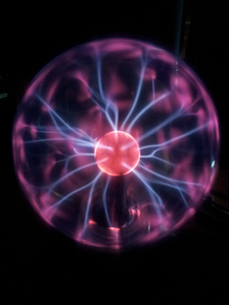 studio shot, indoors, circle, ball, purple, pattern, blue, light - natural phenomenon, no people, aggression, geometric shape, shape, Voltage, motion, Color