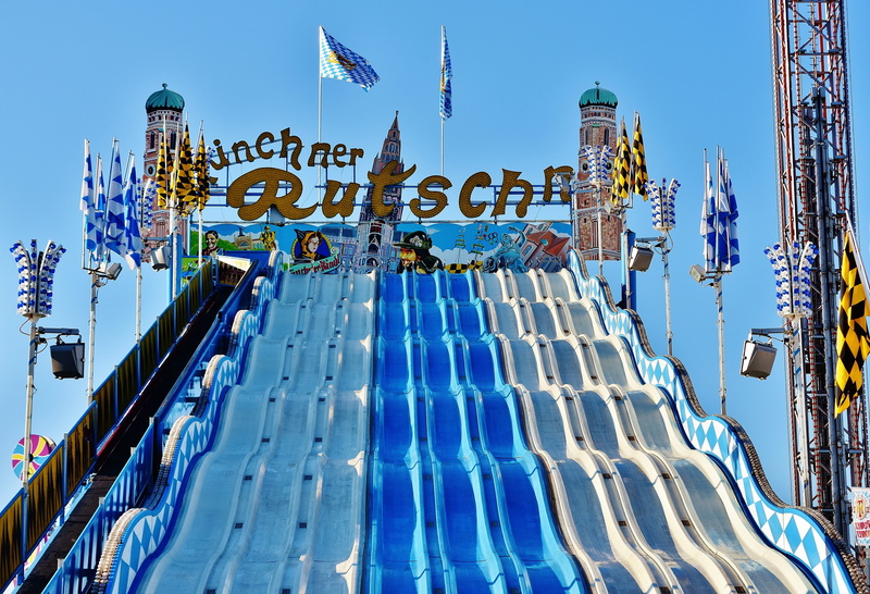building exterior, ride, business, built structure, people, sky, fair, blue, city, pleasure, daytime, celebrate, water, no people, folk festival, pool