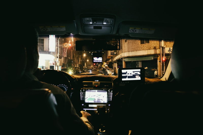 architecture, motor vehicle, vehicle interior, rear view, travel, car, driving, mode of transportation, people, outdoors, night, land vehicle, taipei city