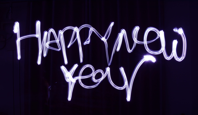 new, long exposure, night, illuminated, no people, 5K, lighting equipment, nightlife, studio shot, black background, single word, message, year, motion