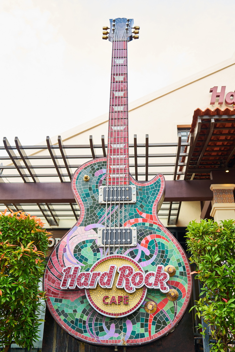 nature, guitar, built structure, sky, exotic, amusement park, the drink, creativity, western script, food, low angle view, symbol, text, entertainment