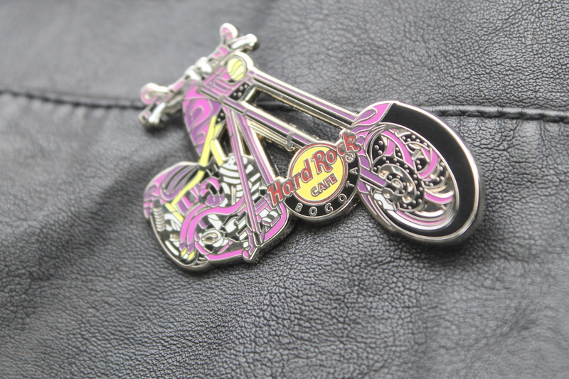 wealth, hard rock cafe, pink color, jewelry, fashion, close-up, positive emotion, heart shape, love, gemstone, pin, high angle view, metal, indoors, luxury