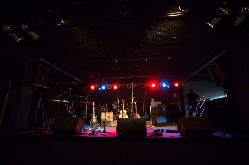 night, stage light, instrument, indoors, men, enjoyment, man, light - natural phenomenon, performance, light, musical, popular music concert, group of people