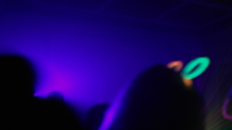 event, projection, club, purple, blue, people, enjoyment, 5K, dance, nightlife, silhouette, indoors, illuminated, human body part, spectator, motion, defocused