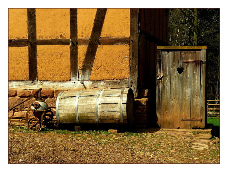 building, heart, cylinder, privy, outdoors, restored, wheel, land, outhouse, building exterior, transfer print, wooden, built structure, no people, truss