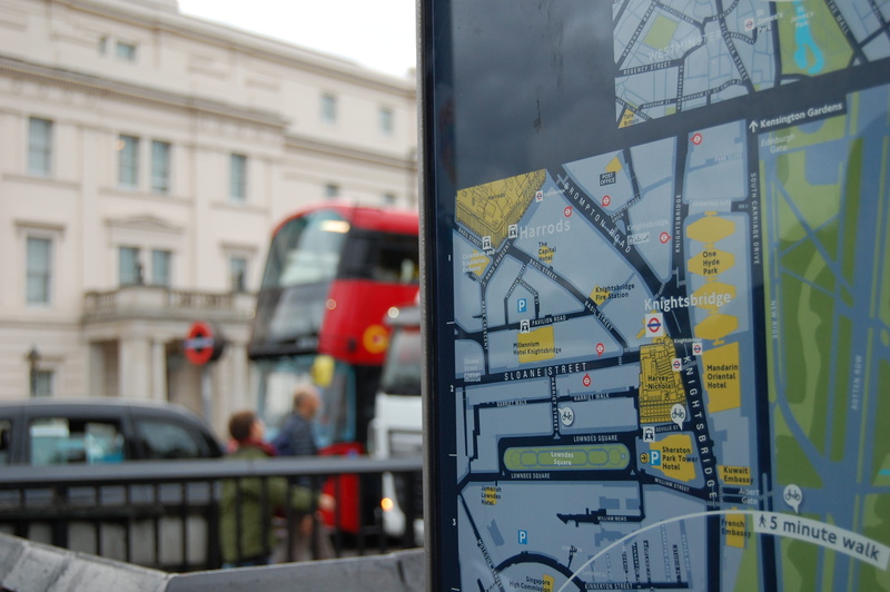 transportation, transparent, motor vehicle, monitor, architecture, public transportation, built structure, incidental people, city, red, displaying, close-up