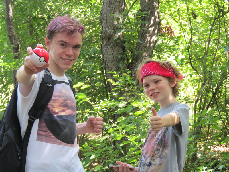 leisure activity, sister, holding, males, looking at camera, emotion, 4K, pokemon go, boys, front view, plant, smiling, men, happiness, portrait, lifestyles