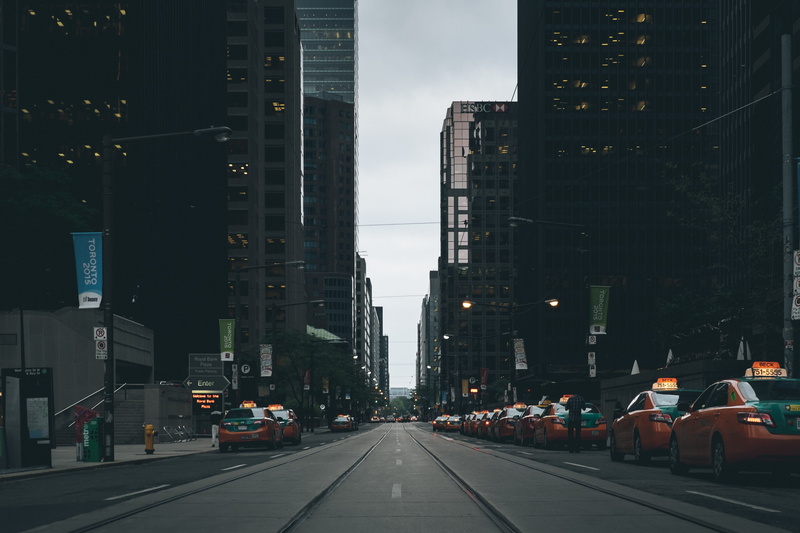 taxis, traffic, outdoors, light, car, building exterior, skyscrapers, Torronto, city, motor vehicle, office building exterior, mode of transportation, road