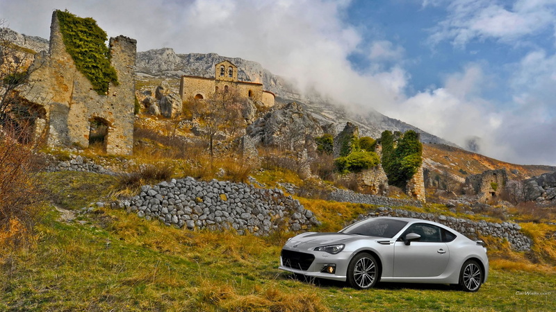 sky, travel, cloud - sky, nature, non-urban scene, land vehicle, day, car, ruin, motor vehicle, land, mountain, ford, stone wall, mustang, the past, environment