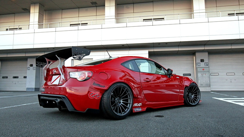 transportation, coupe, shiny, day, no people, Sports car, Red, mode of Transport, status Car, motor Vehicle, street, sport, speed, built structure